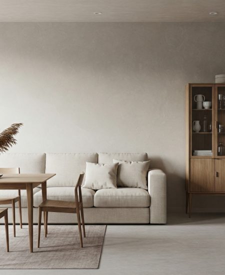 Elegant minimalist Scandinavian living room featuring modern furniture and neutral tones.